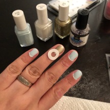 Essie: Find Me An Oasis (blue), Marshmallow (white) and Good As Gold (gold) Tools: Avery Reinforcement Labels