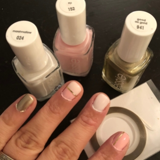 Essie: Fiji (pink), Marshmallow (white) and Good As Gold (gold) Tools: Nail Striping Tape in Gold
