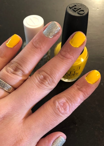 Essie: Beyond Cozy (glitter) and OPI: Exotic Birds Do Not Tweet (yellow)
