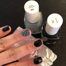 Essie: Licorice (black) and Petal Pushers (gray)