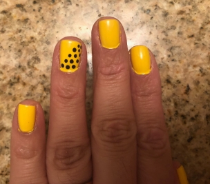 OPI Exotic Birds Do Not Tweet (canary yellow) and Essie Licorice (black)